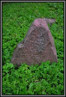 Tombstone in the Kelme cemetery. August 2009