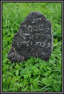 Tombstone in the Kelme cemetery. August 2009