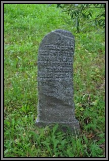 Tombstone in the Kelme cemetery. August 2009