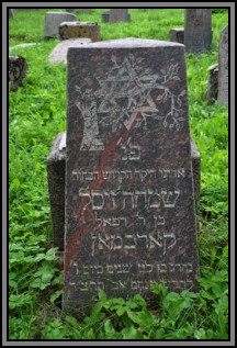 Tombstone in the Kelme cemetery. August 2009