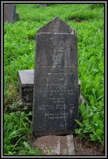 Tombstone in the Kelme cemetery. August 2009